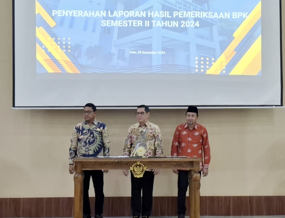 Wakil bupati touna Ilham Lawidu, menerima Laporan Hasil Pemeriksaan (LHP) dari Badan Pemeriksa Keuangan (BPK). bertempat di Auditorium BPK Perwakilan Provinsi Sulawesi Tengah, Jumat (20/12/2024).