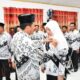 Bupati Tojo Una-Una, Ilham Lawidu, S.H., secara resmi mengukuhkan Hajar Lawidu, S.Kep., Ns., sebagai Ibunda Guru PGRI untuk masa bakti 2025–2030.