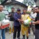 Polres Parimo menyalurkan 100 paket sembako kepada warga Dusun III, Desa Toboli Barat, Kecamatan Parigi Utara