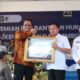 Bupati Touna Ilham Lawidu menerima Piagam Penghargaan, penandatanganan Nota Kesepahaman (MoU) dengan Kantor Wilayah Kementerian Hukum Sulawesi Tengah