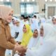 Wakil Bupati Tojo Una-Una, Hj. Surya membuka secara resmi kegiatan Manasik Haji