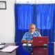 Direktur PDAM UE Tanah Kabupaten Tojo Una-Una, Mukmin Syah Latjuba, terlihat di ruang kerjanya, Senin (22/6/2026), saat menyampaikan informasi mengenai perluasan layanan pembayaran rekening air.