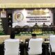 Suasana Rapat Paripurna DPRD Kabupaten Tojo Una-Una, Rabu (24/6/2026), saat Bupati Ilham Lawidu menyampaikan Rancangan Peraturan Daerah tentang Pertanggungjawaban Pelaksanaan APBD Tahun Anggaran 2025. Di hadapan Ketua DPRD Gusnar A. Suleman, Wakil Ketua DPRD, anggota dewan, dan pimpinan instansi, Bupati mengumumkan keberhasilan mempertahankan opini Wajar Tanpa Pengecualian (WTP) untuk keempat belas kalinya, serta memaparkan rincian realisasi pendapatan, belanja, dan sisa anggaran sebagai wujud akuntabilitas pengelolaan keuangan daerah.