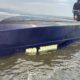 Speedboat bernama MISTER UN terlihat terbalik dan terdampar di pesisir Pantai Desa Malanggo, Kecamatan Tinombo Selatan, Kabupaten Parigi Moutong, Kamis (30/7/2026).