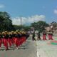 Pasukan baris-berbaris mengenakan seragam lengkap dengan penutup kepala berwarna kuning tampak berlatih dengan tertib dan kompak di lapangan terbuka, persiapan menyambut peringatan HUT Kemerdekaan RI ke-81 di wilayah Kabupaten Tojo Una-Una, Selasa (11/8/2026).