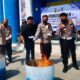 Dirlantas Polda Sulawesi Tengah Kombes Pol Agung Tri Widiantoro bersama jajaran pejabat dan instansi terkait melakukan pembakaran material registrasi dan identifikasi (Regident) kendaraan bermotor yang sudah usang dan tidak berlaku lagi,