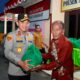 Kapolda Sulawesi Tengah Irjen Pol Nasri menyerahkan bantuan sembako secara simbolis kepada warga penerima manfaat dalam kegiatan bakti sosial di Markas Polsek Ampana Tete, Kabupaten Tojo Una-Una, Senin (24/8/2026).