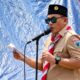 Asisten III Bidang Administrasi Umum Setda Touna, Alimudin Muhammad, saat memberikan sambutan dalam pembukaan Kemah Pramuka Gugus Depan Tandjumbulu di kawasan Pasar Sansarino, Jumat (25/9/2026). (Foto: Istimewa)