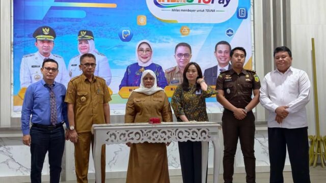 peluncuran resmi aplikasi IHLASToPay di Ruang Auditorium Kantor Bupati Tojo Una-Una, Selasa (27/10/2026).