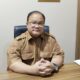 Kepala Dinas Pengendalian Penduduk dan Keluarga Berencana (P2KB) Kabupaten Tojo Una-Una, dr. Niko, S.Ked., M.KM., MM., saat memberikan keterangan kepada awak media di ruang kerjanya